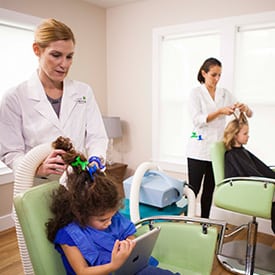 Receive our signature AirAlle® lice treatment service in-clinic.